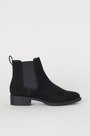 Schwarze Chelsea Boots