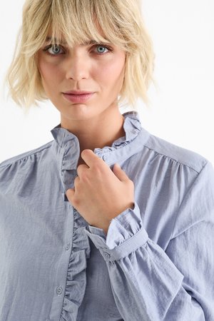 Bluse mit fließendem Webstoff