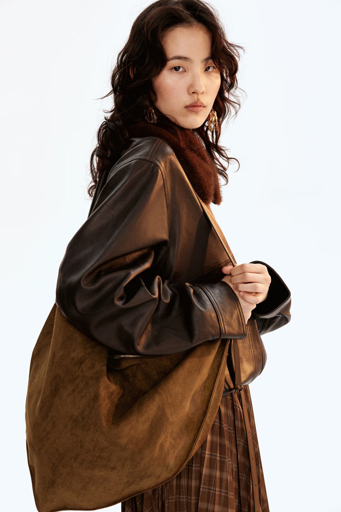 Dreieckige Crossbody-Tasche