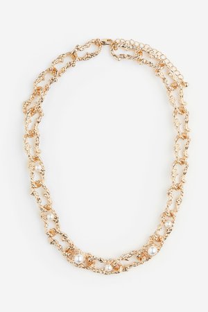 Halskette mit Perlen in Gold