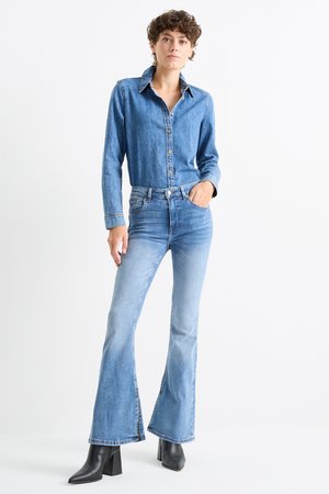 Flared Jeans - Mid Waist - LYCRA